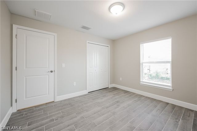 919 Rita AVE N, Lehigh Acres, FL 33971