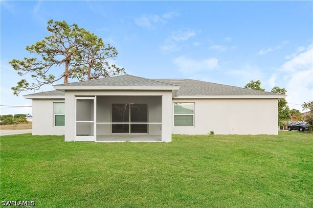 919 Rita AVE N, Lehigh Acres, FL 33971
