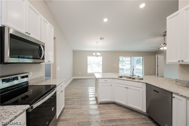 919 Rita AVE N, Lehigh Acres, FL 33971
