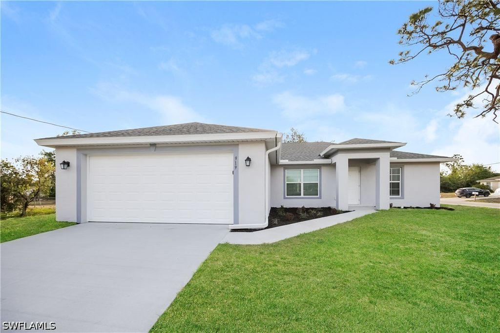 919 Rita AVE N, Lehigh Acres, FL 33971