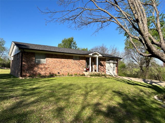 303 N Caesar Street, Ennis, TX 75119