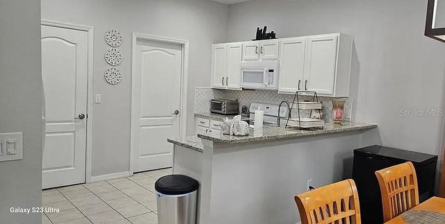 1453 ROYAL RIDGE DRIVE, Davenport, FL 33896