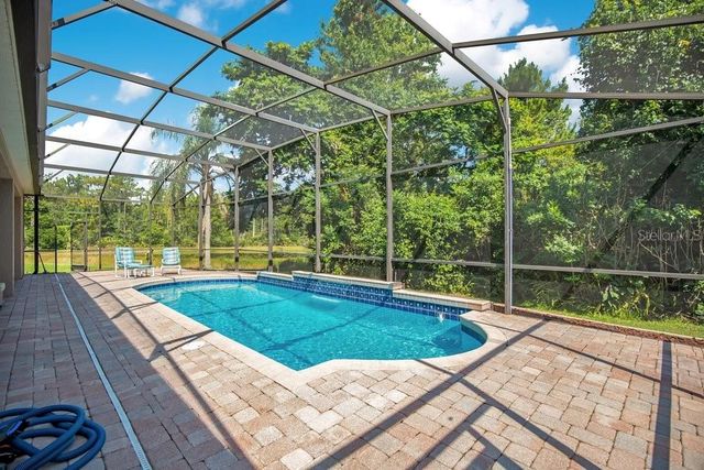 9211 SHADOW PINAR COURT, Orlando, FL 32825