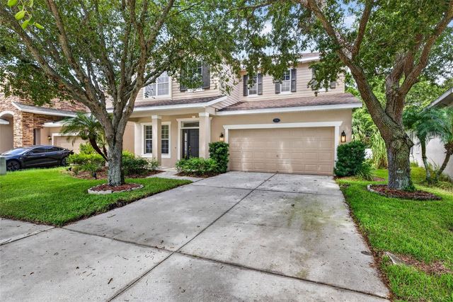 7906 CAMDEN WOODS DRIVE, Tampa, FL 33619