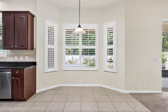 7906 CAMDEN WOODS DRIVE, Tampa, FL 33619