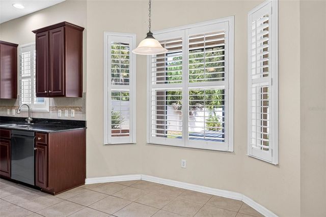 7906 CAMDEN WOODS DRIVE, Tampa, FL 33619