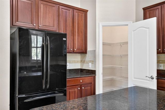 7906 CAMDEN WOODS DRIVE, Tampa, FL 33619