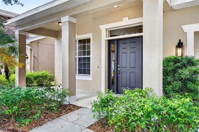 7906 CAMDEN WOODS DRIVE, Tampa, FL 33619