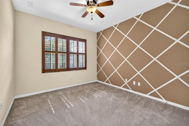 7906 CAMDEN WOODS DRIVE, Tampa, FL 33619