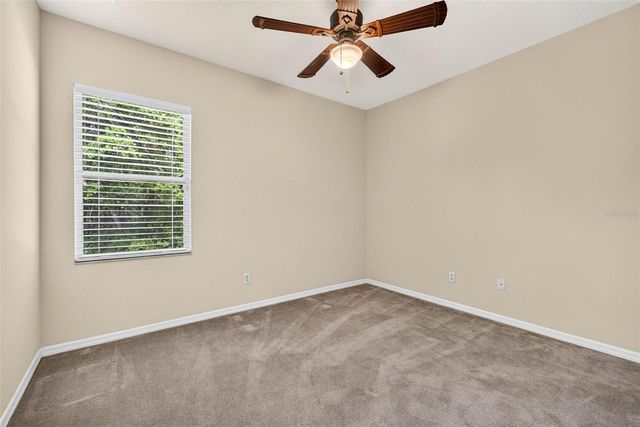 7906 CAMDEN WOODS DRIVE, Tampa, FL 33619