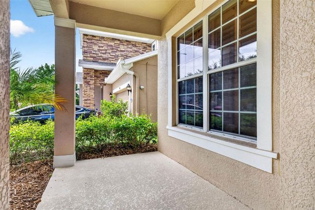 7906 CAMDEN WOODS DRIVE, Tampa, FL 33619