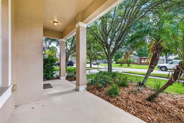 7906 CAMDEN WOODS DRIVE, Tampa, FL 33619