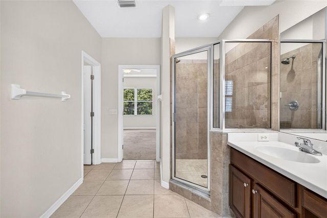 7906 CAMDEN WOODS DRIVE, Tampa, FL 33619