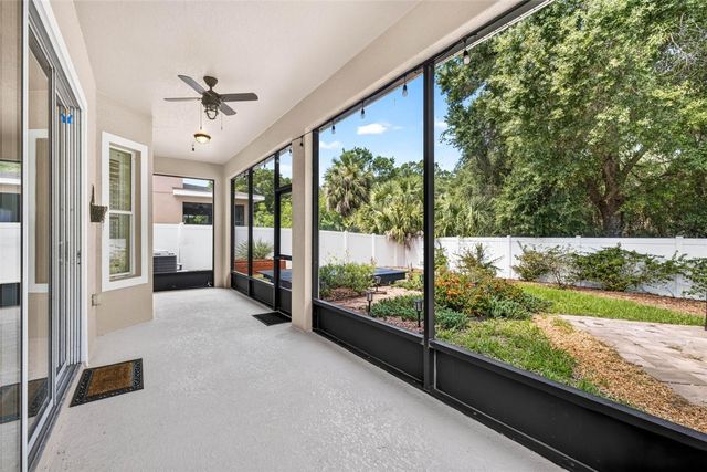 7906 CAMDEN WOODS DRIVE, Tampa, FL 33619