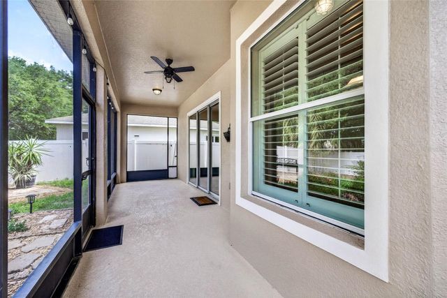 7906 CAMDEN WOODS DRIVE, Tampa, FL 33619