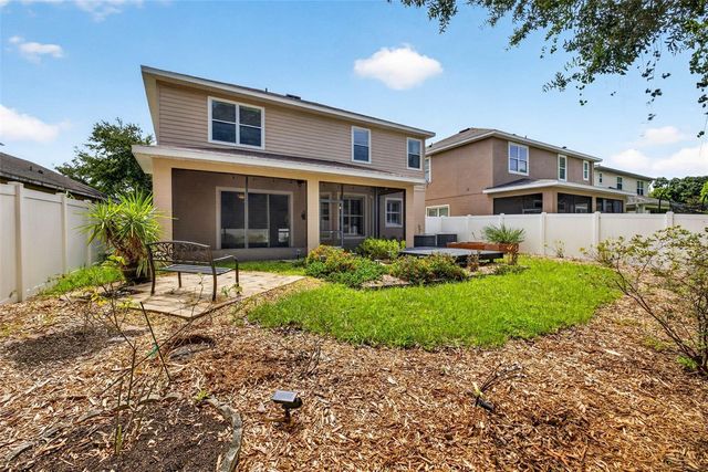 7906 CAMDEN WOODS DRIVE, Tampa, FL 33619