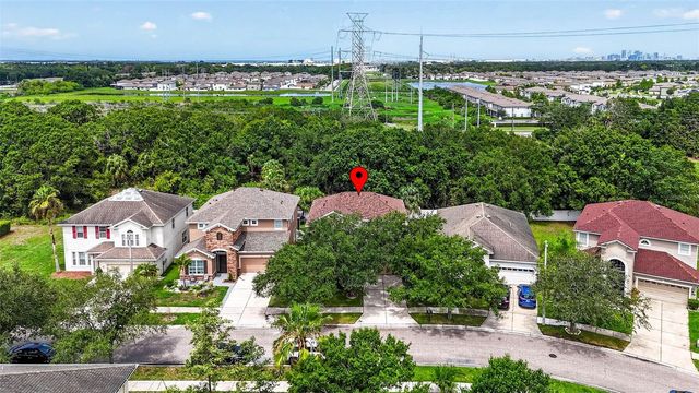 7906 CAMDEN WOODS DRIVE, Tampa, FL 33619