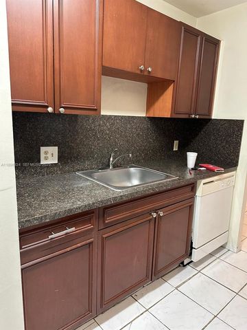 2051 NW 46th Avenue F102, Lauderhill, FL 33313