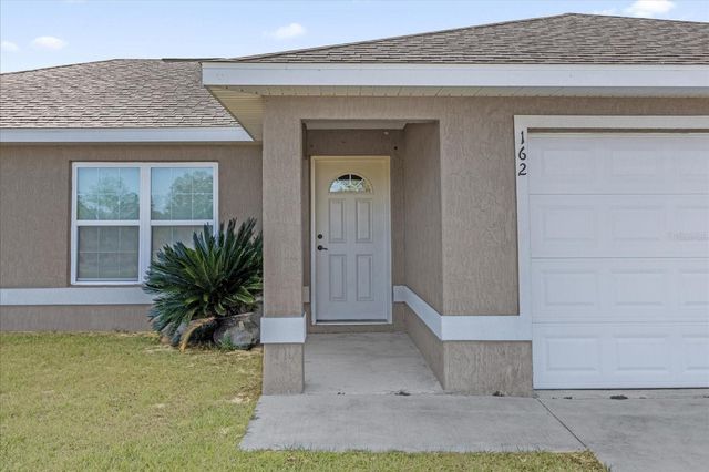 162 MALAUKA RUN, Ocklawaha, FL 32179