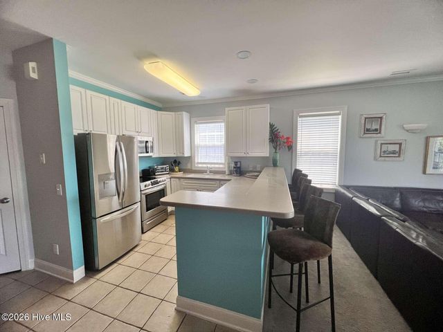 2555 St James Drive SE Unit 303, Oak Island, NC 28461