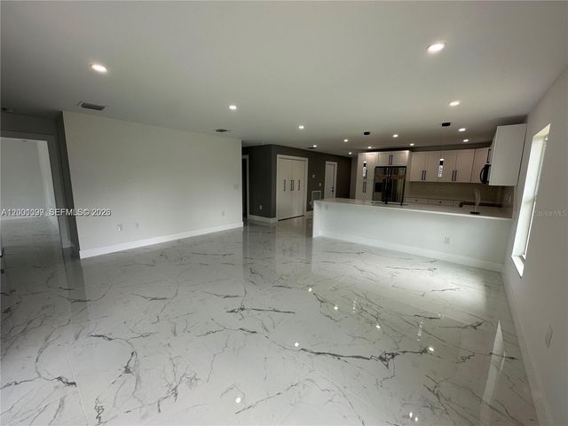 1125 MILWAUKEE BOULEVARD, Lehigh Acres, FL 33974