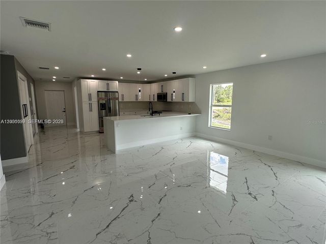 1125 MILWAUKEE BOULEVARD, Lehigh Acres, FL 33974