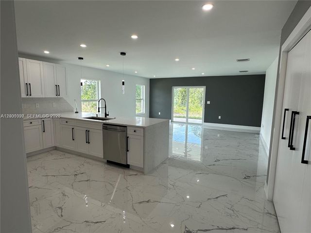 1125 MILWAUKEE BOULEVARD, Lehigh Acres, FL 33974