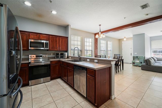 7105 RED LANTERN DRIVE 13C, Harmony, FL 34773