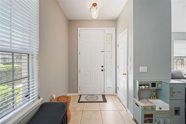 7105 RED LANTERN DRIVE 13C, Harmony, FL 34773