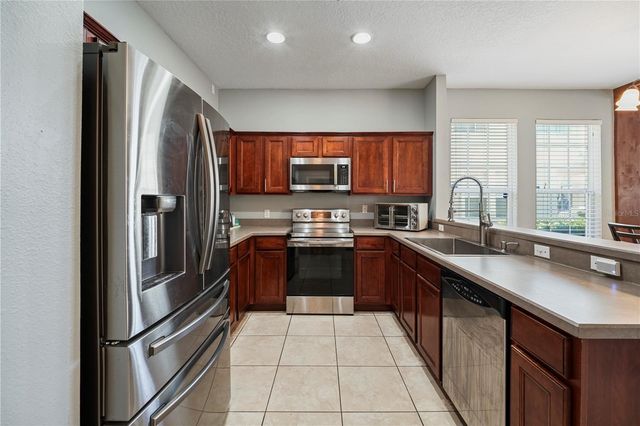 7105 RED LANTERN DRIVE 13C, Harmony, FL 34773