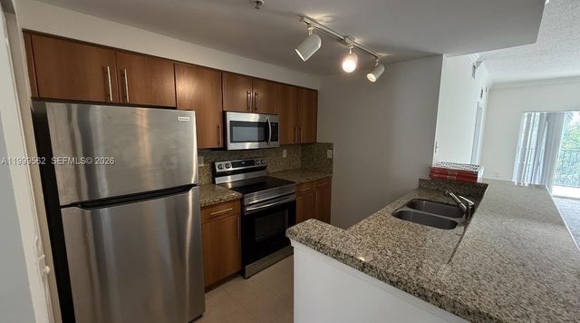 5800 W Sample Rd 307, Coral Springs, FL 33067