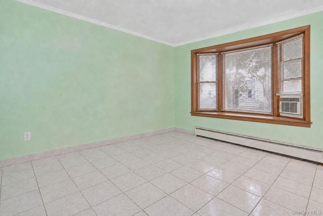 94-32 77th Street, Ozone Park, NY 11416
