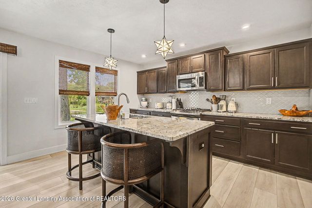 9660 Tobermory Drive, Haslett, MI 48840