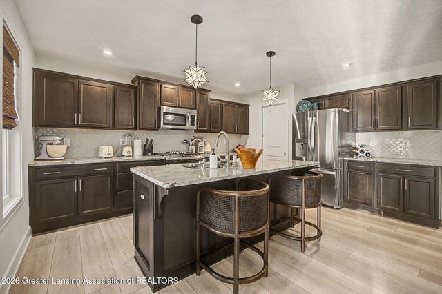 9660 Tobermory Drive, Haslett, MI 48840