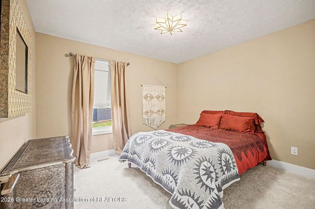 9660 Tobermory Drive, Haslett, MI 48840