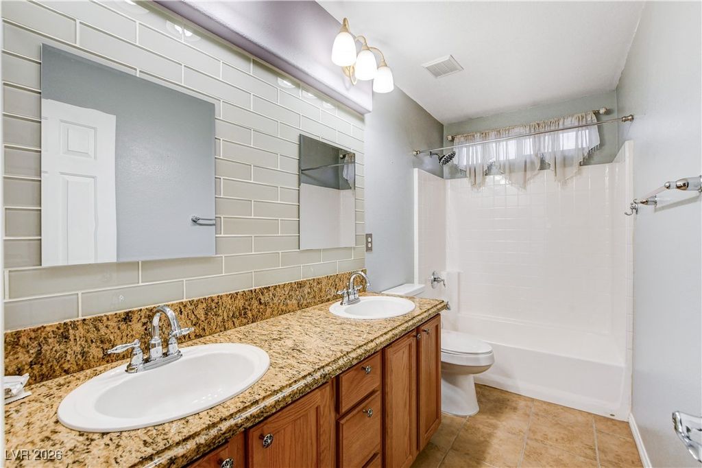 Image 32 of property listing at 7746 Tree Lane Peak Court, Las Vegas, NV 89166