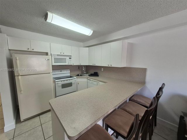 15969 NW 64th Ave 217, Miami Lakes, FL 33014