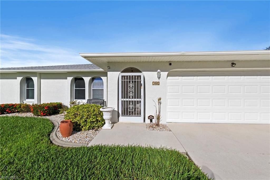 702 10th AVE, CAPE CORAL, FL 33990 — exterior