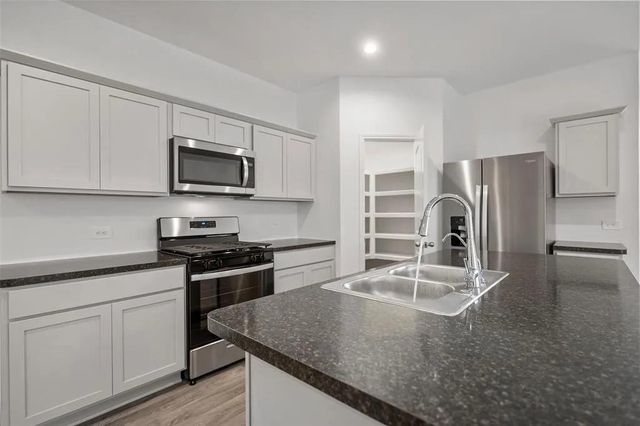 24346 Elmwood Falls Drive, Spring, TX 77373