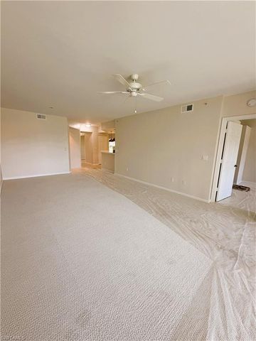 7518 Silver Trumpet LN 101, Naples, FL 34109