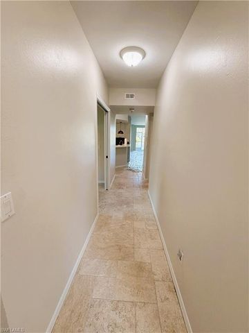 7518 Silver Trumpet LN 101, Naples, FL 34109