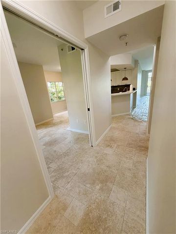 7518 Silver Trumpet LN 101, Naples, FL 34109