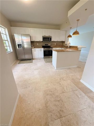 7518 Silver Trumpet LN 101, Naples, FL 34109