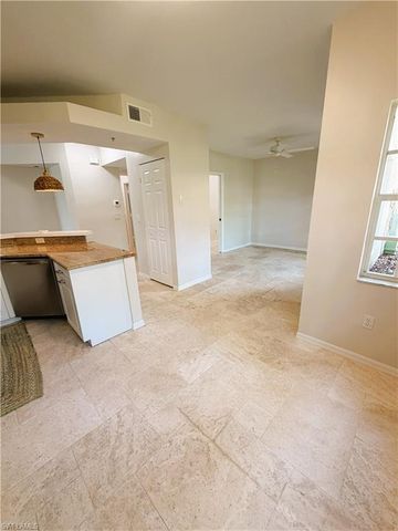 7518 Silver Trumpet LN 101, Naples, FL 34109