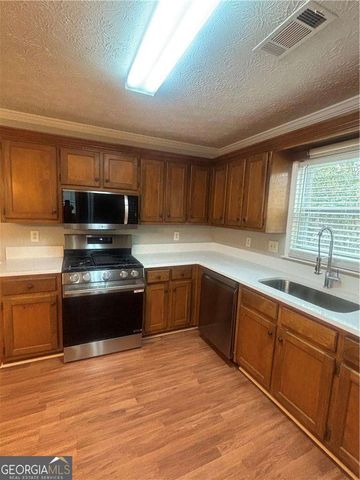 1135 Burning Bush Drive, Loganville, GA 30052