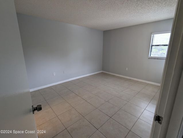 1051 Clearmont Street NE 202, Palm Bay, FL 32905