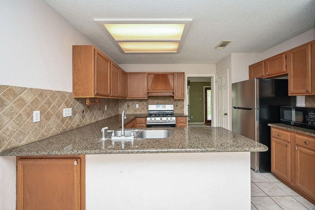 9826 Chiselhurst Drive, Houston, TX 77065