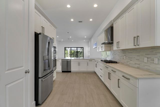 5619 Delacroix Terrace, Palm Beach Gardens, FL 33418