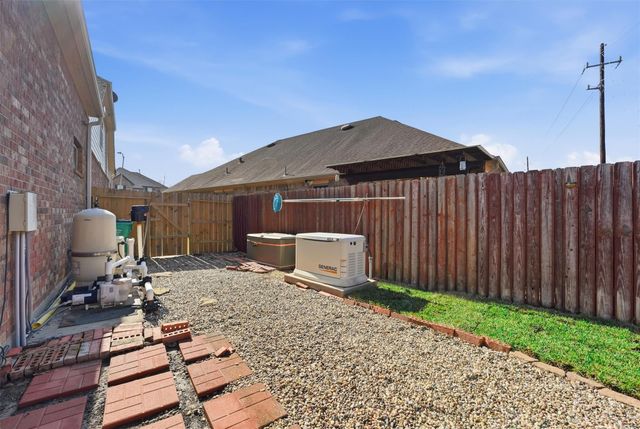 24630 Emerald Pool Falls Drive, Tomball, TX 77375