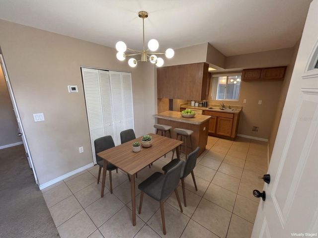 5568 GREEN SHADOWS PLACE 21-1, Orlando, FL 32811